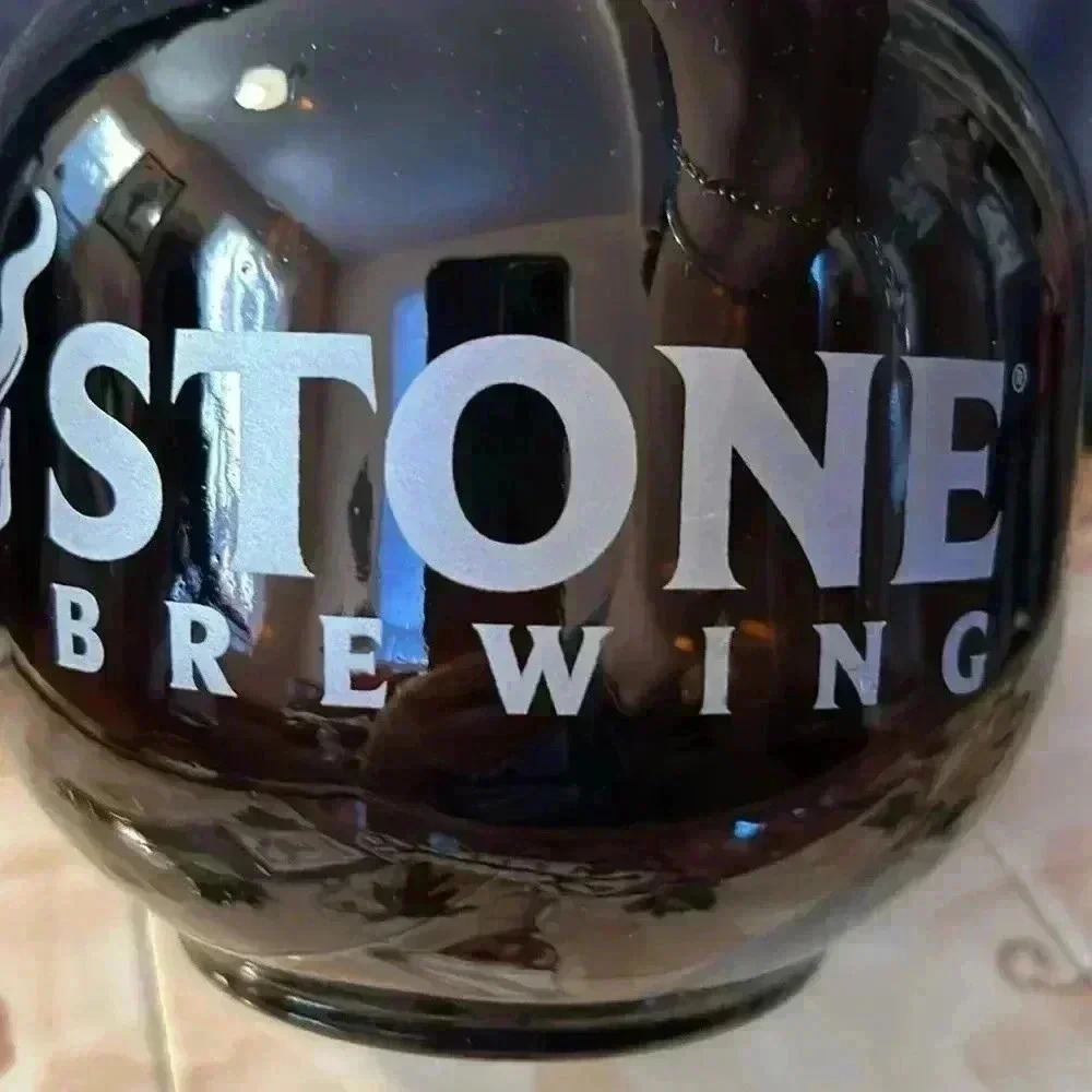 Glass beer jug.